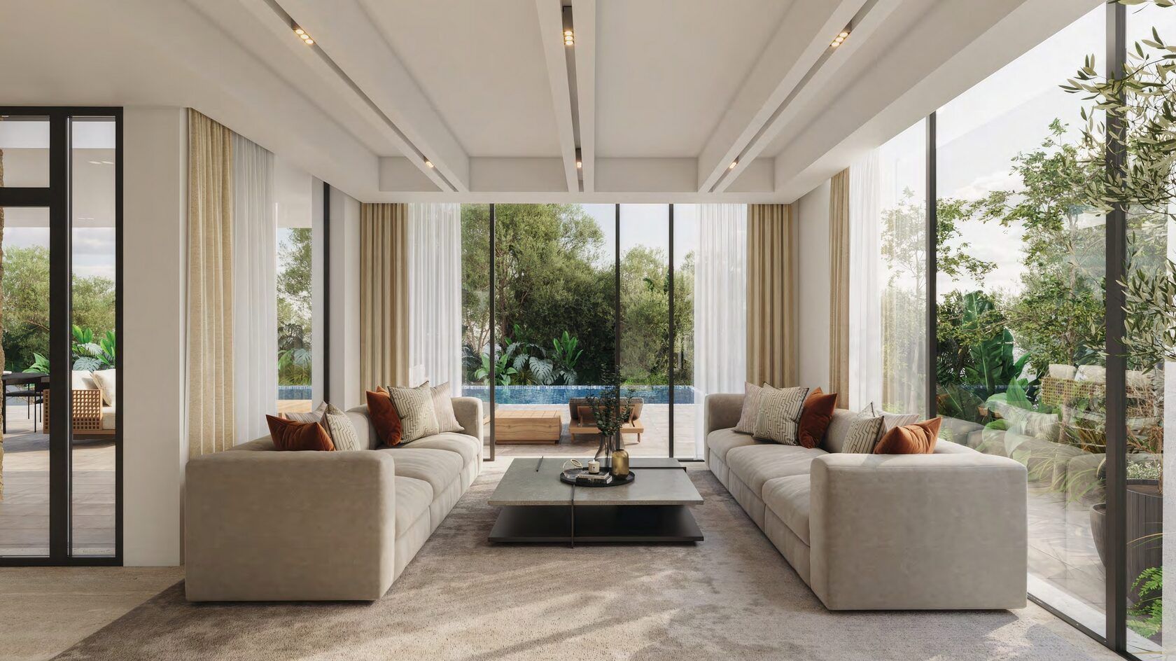 Modern living room with floor-to-ceiling windows, two beige sofas, and a view of a pool.