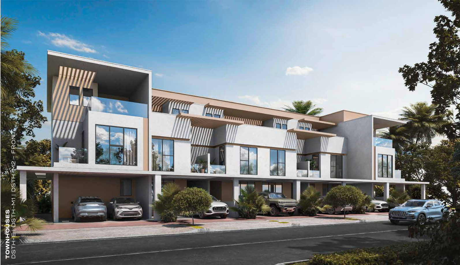 Modern townhouses with covered parking, white and beige facade, blue sky.