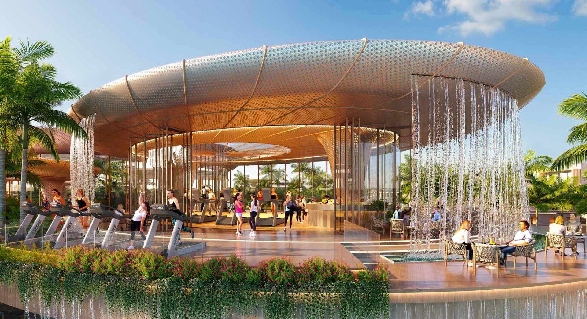 Modern gym with glass walls, water features, and people exercising and relaxing.