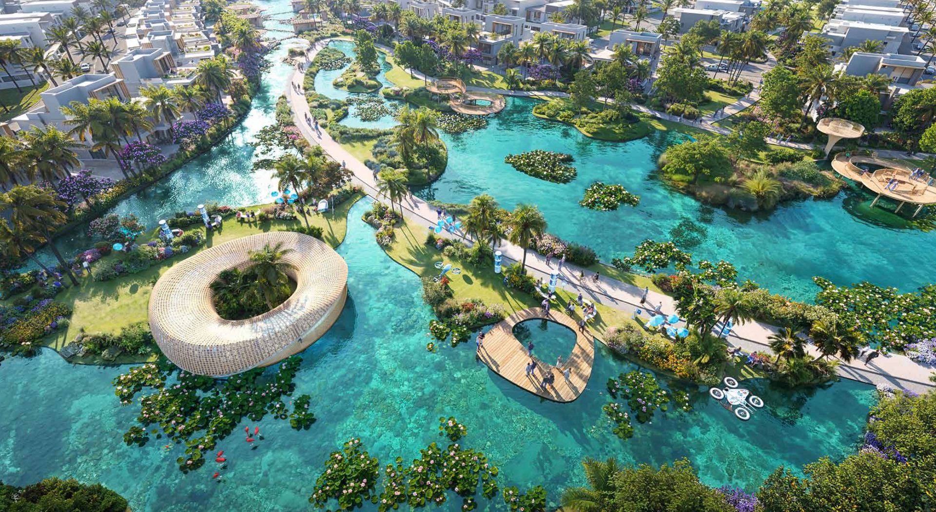 Aerial view of a lush park with waterways, islands, walkways, and a circular, woven structure.
