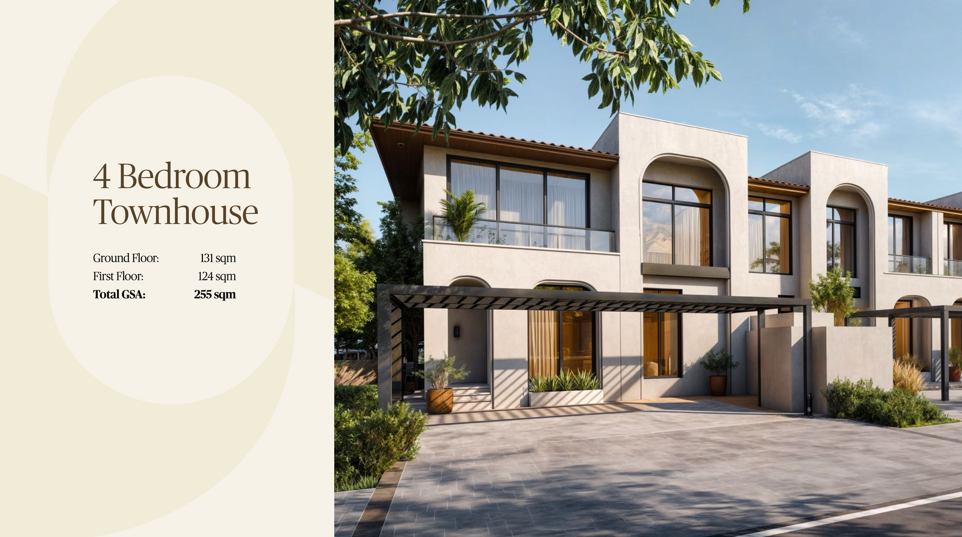 Exterior of a two-story beige townhouse with large windows and a covered entrance.