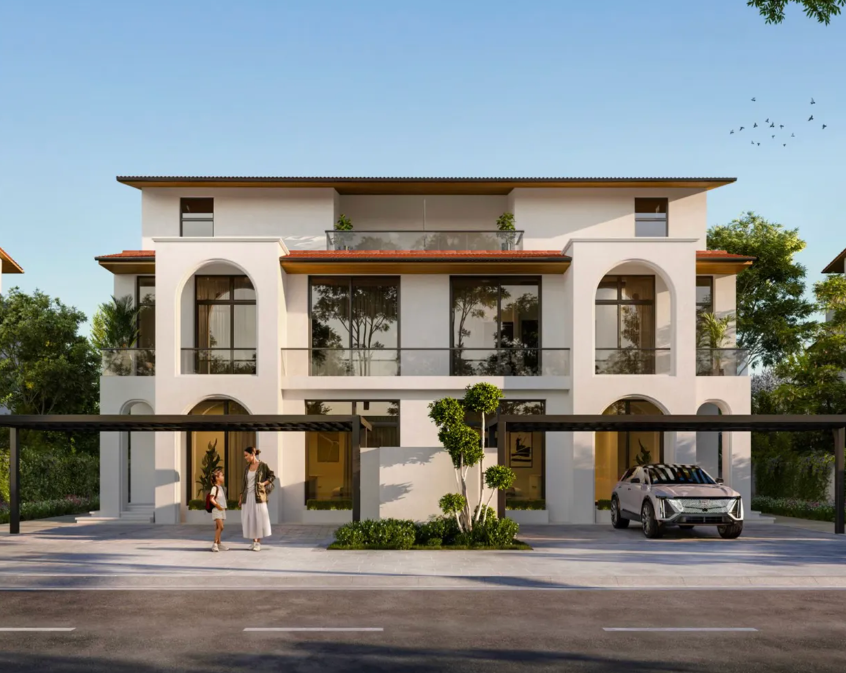 Two-story white house with arched windows and a covered carport; a car and two people are in front.