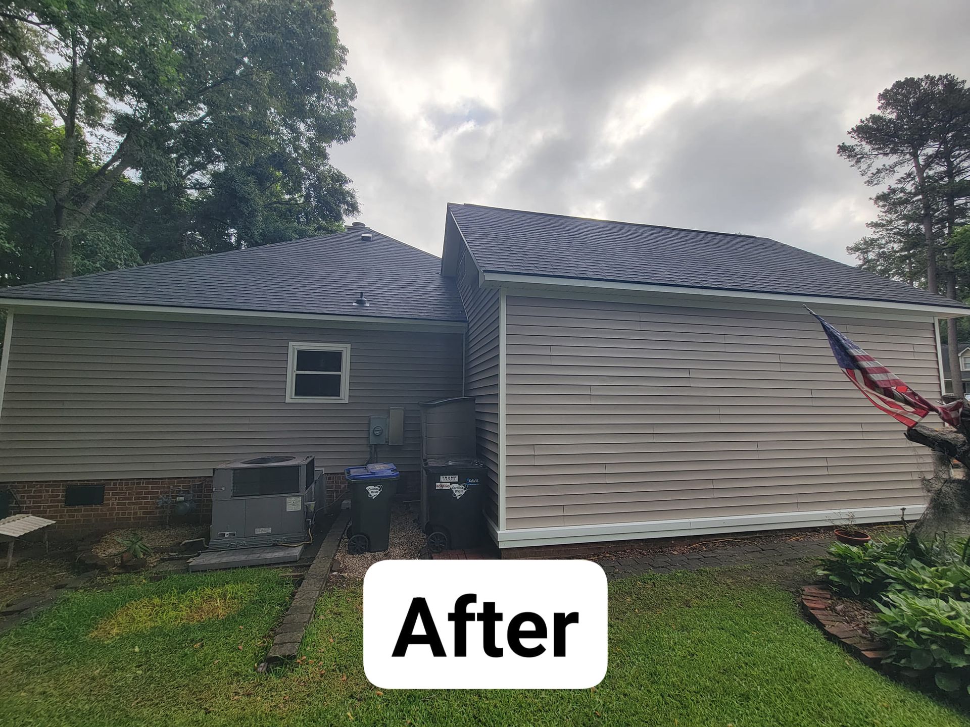 A picture of a house with a roof that has been installed.