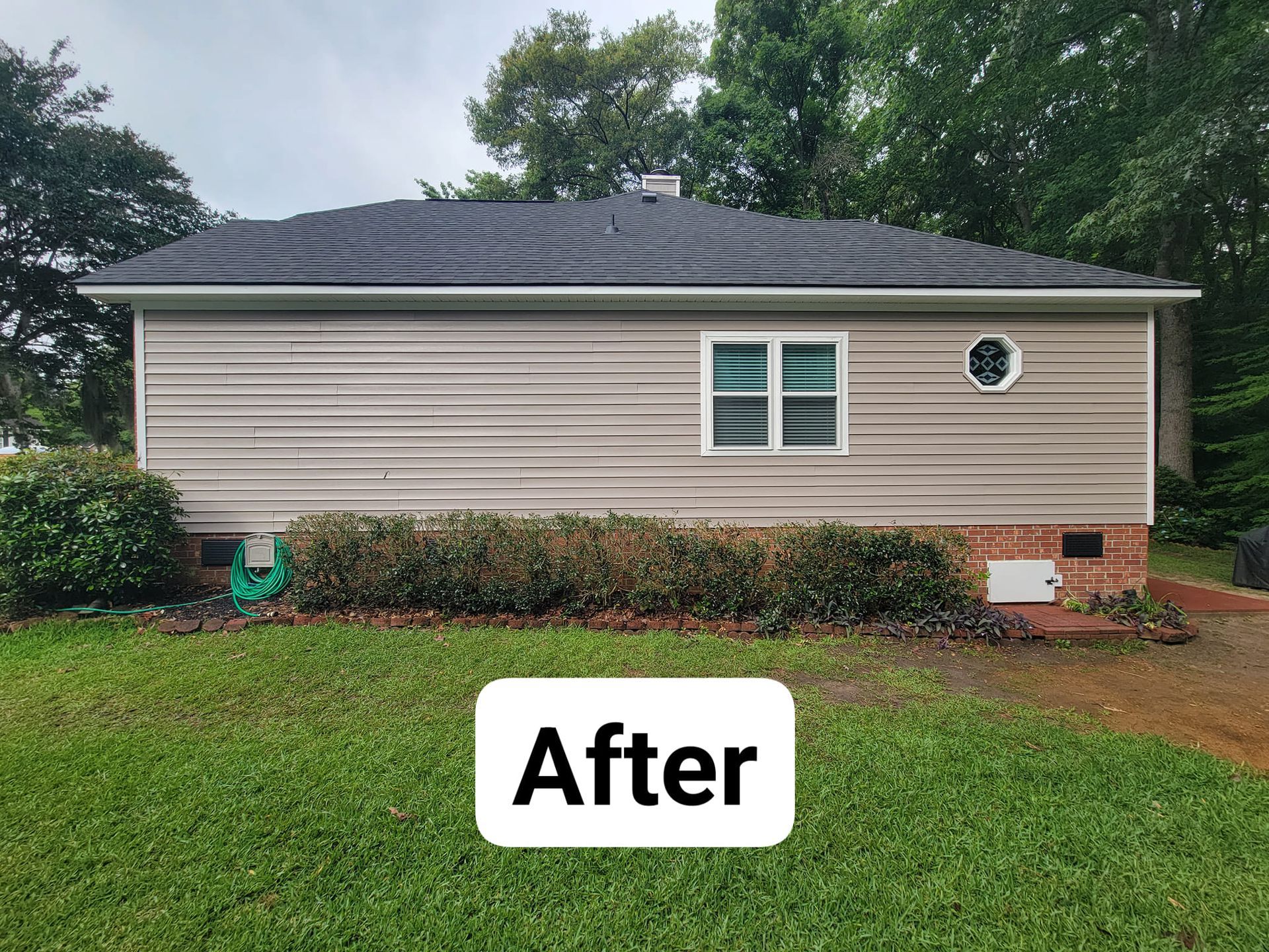 A picture of a house after being painted.