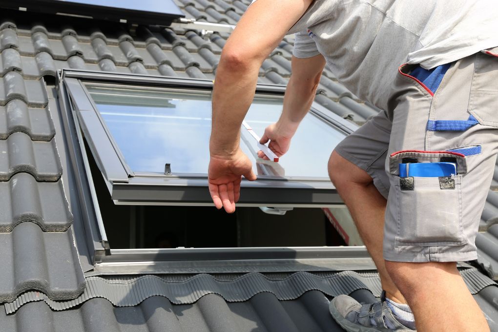 Roofers Kilmarnock repairing a skylight