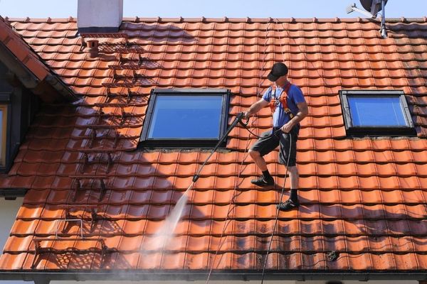 Roofers Kilmarnock cleaning a tiled roof