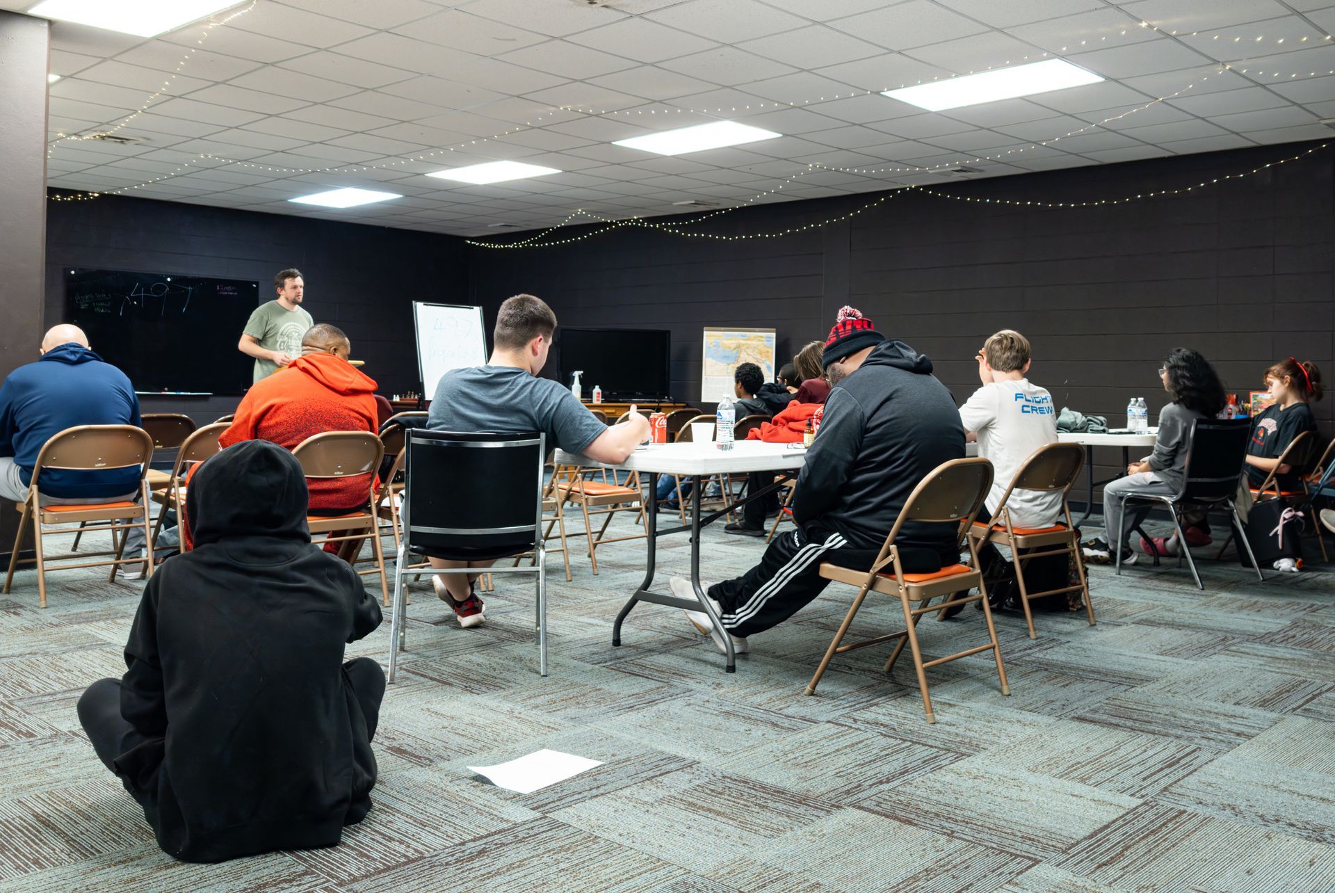 Youth listen as Andrew Wilson preaches.