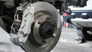 Up close to brake under vehicle | Tedious Auto Repair