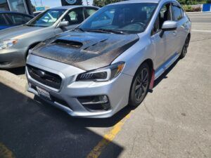 AWD parked in parking lot | Tedious Auto Repair