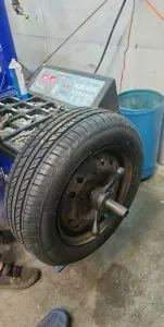 Tire balancing in progress | Tedious Auto Repair