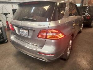 Back view of gray van in our garage | Tedious Auto Repair