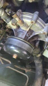 Up close to water pump in vehicle | Tedious Auto Repair
