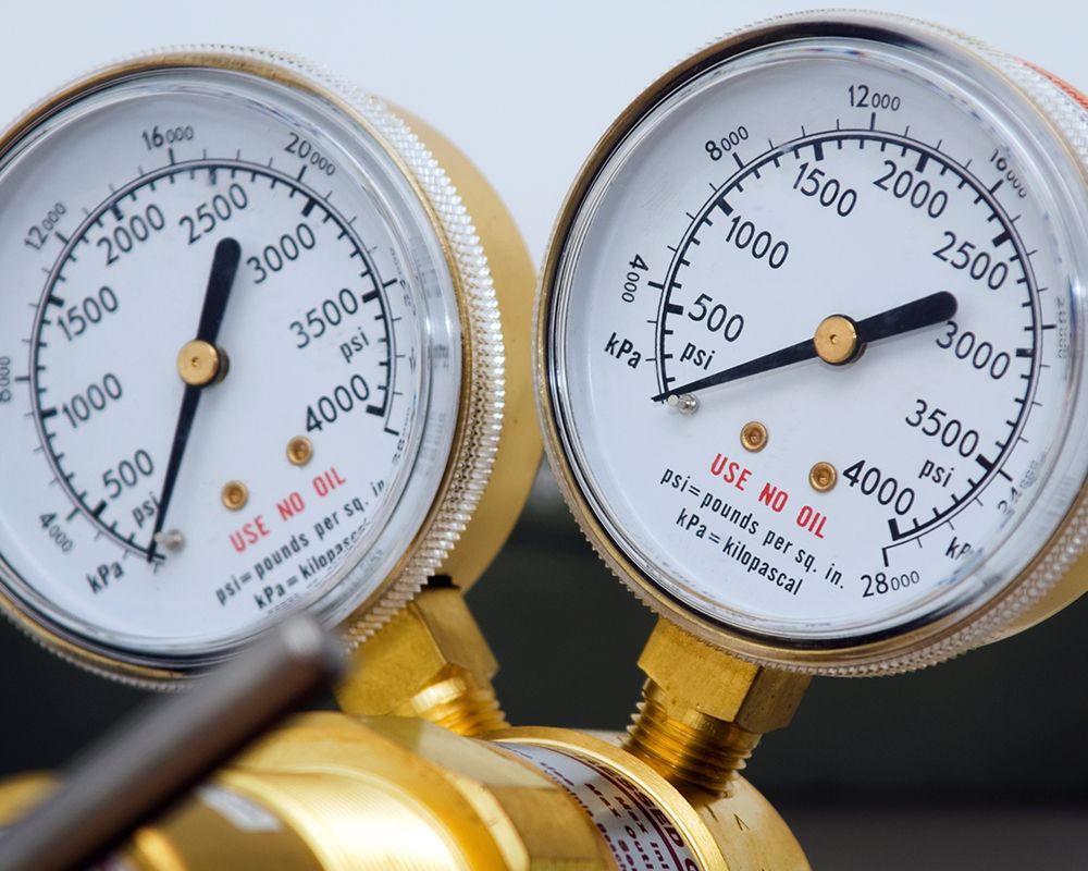 Pressure gauges for commercial refrigeration equipment at Cooper Hawkins in Oakland, CA, ensuring to