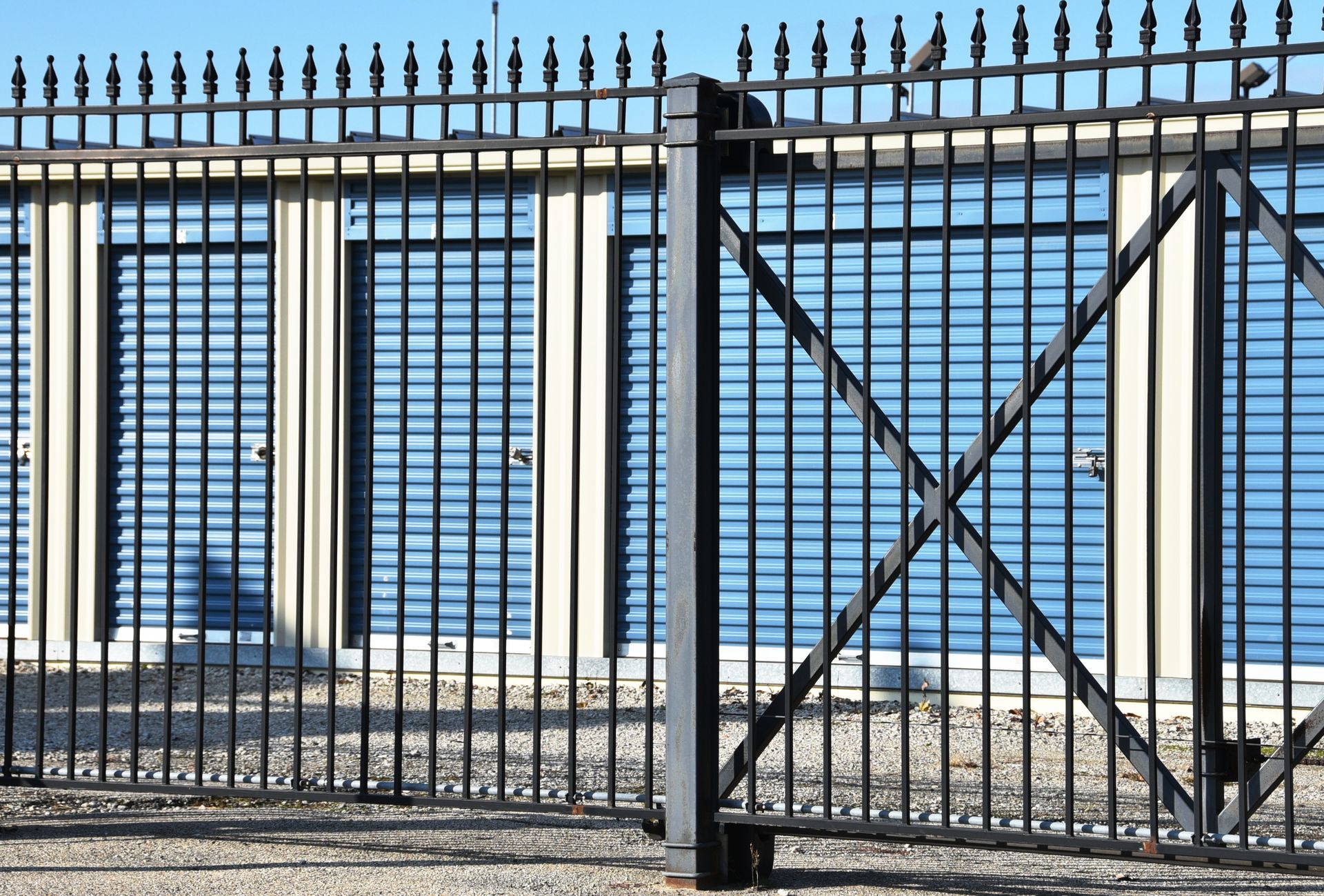 Storage garage behind a metal fence. Storage garage behind a metal fence.
