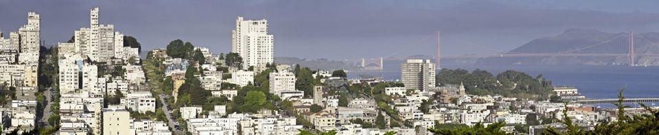 Panoramic vista over the avenue and boulvards, steep hills and iconic landmarks of San Francisco, from the slalom curves of Lombard Street to the blue Pacific water of the Bay and the distinctive red towers of the Golden Gate Bridge stretching to the Marin Headlands of Northern California. ProPhoto RGB profile for maximum color fidelity and gamut.  [b]See more great images of San Francisco in this lightbox:[/b]  [url=http://www.istockphoto.com/search/lightbox/6898088][img]http://www.fotovoyager.com/istock/lightbox_sanfrancisco.jpg[/img][/url]  [b]See many more great images of California in this lightbox:[/b]  [url=http://www.istockphoto.com/search/lightbox/2837117][img]http://www.fotovoyager.com/istock/lightbox_california.jpg[/img][/url]  [b]See many more great panoramic images here:[/b]  [url=http://www.istockphoto.com/search/lightbox/384048][img]http://www.fotovoyager.com/istock/lightbox_panoramas.jpg[/img][/url]