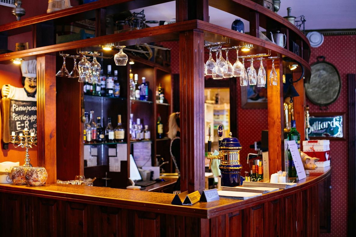 A bar with a sign that says billiards on it