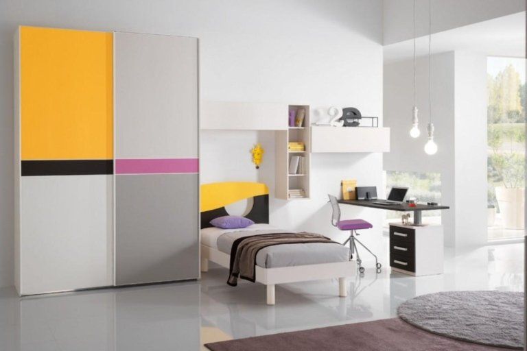 cameretta con letto singolo e postazione studio