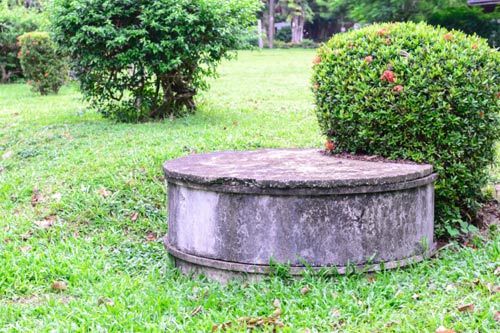 Cement Septic Tank In Backyard