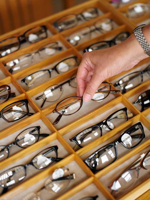 Man Choosing Eye Glasses - Eye Glasses in Greenwood, IN
