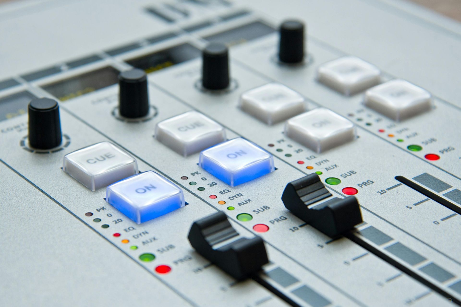 A close up of a mixer with buttons that say on and off
