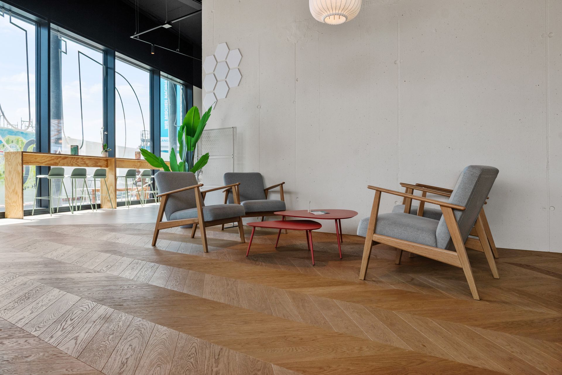 There are two chairs and a table in the room.