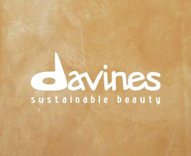 Davines logo: white text on a tan background,