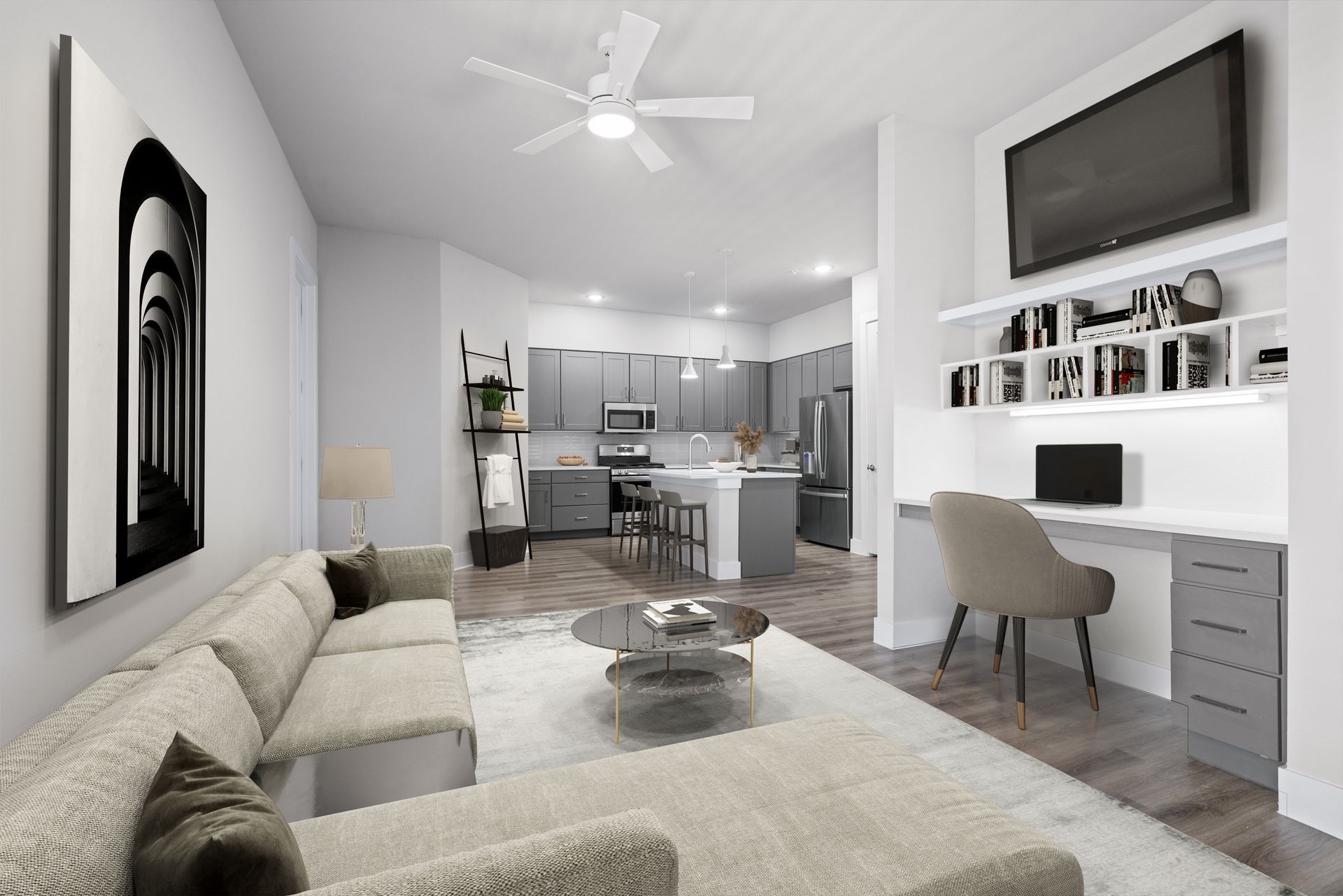 A luxury living room with a couch, chair, coffee table, and ceiling fan at The Wyatt, offers pet-friendly apartments in Austin, TX.