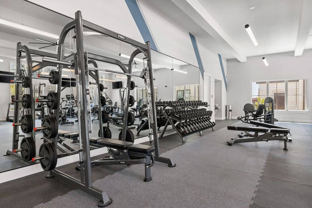 A large gym filled with lots of exercise equipment in Austin apartments for rent at The Wyatt.