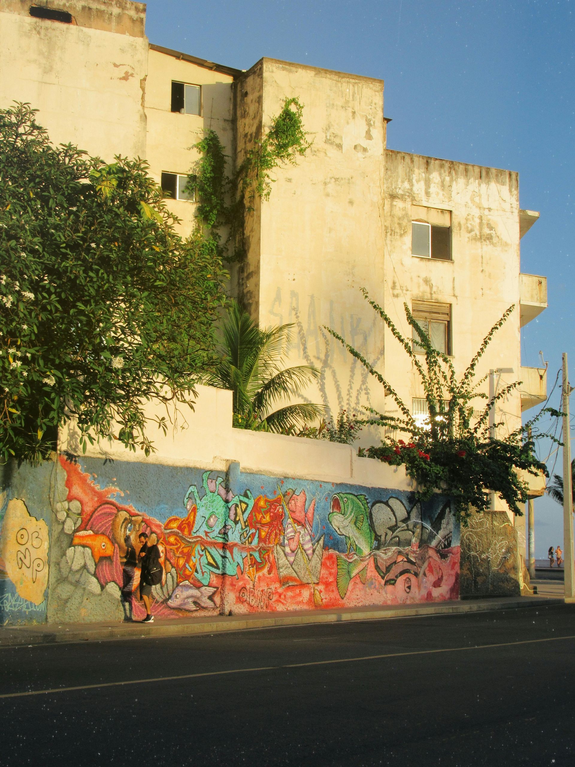 A building with graffiti on the side of it