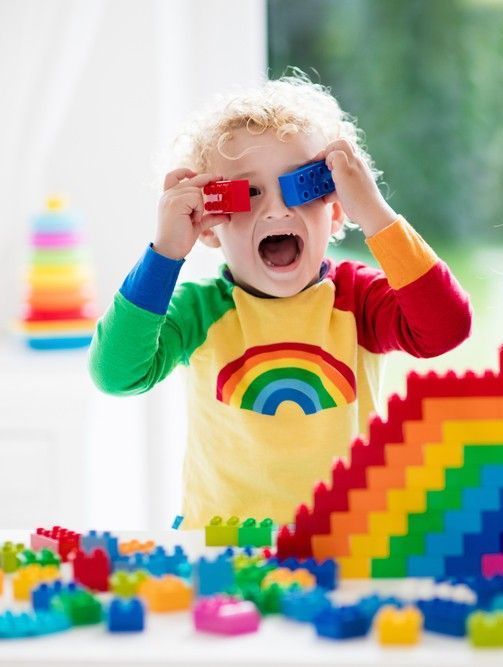A Boy and a Girl Are Playing With Colorful Lego Blocks — Birralee Child Care Centre Assn Inc In Mackay, QLD