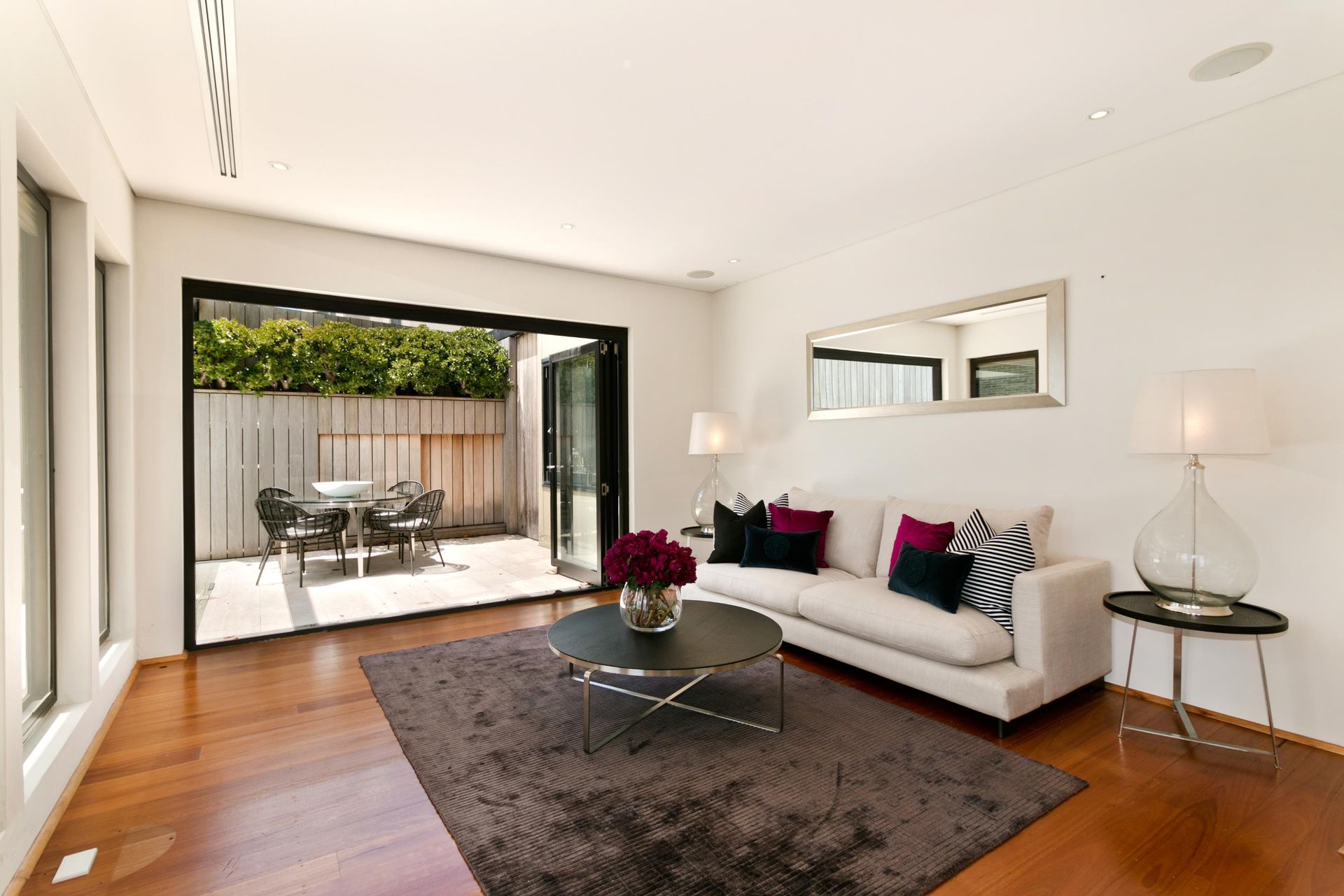 A living room with a couch and a coffee table.