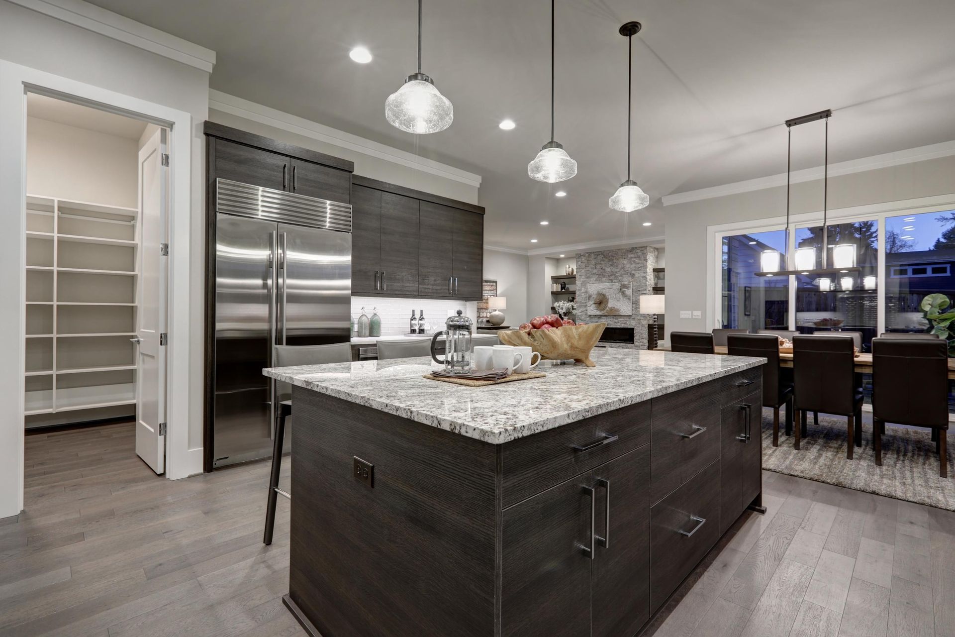 There is a large island in the middle of the kitchen.