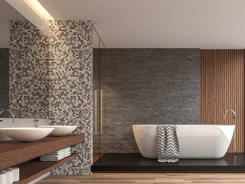 A bathroom with two sinks and a bathtub.