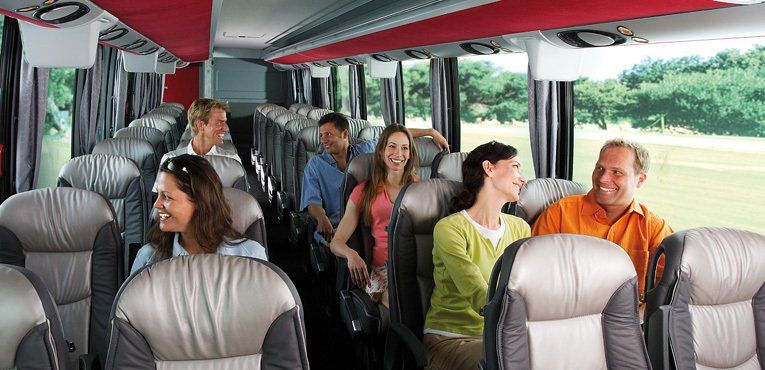 Happy People on Bus — Norcross, GA — Crown Charters