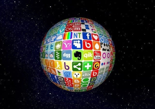 A sphere of colorful app icons, suggesting digital connectivity against a dark, swirling background.