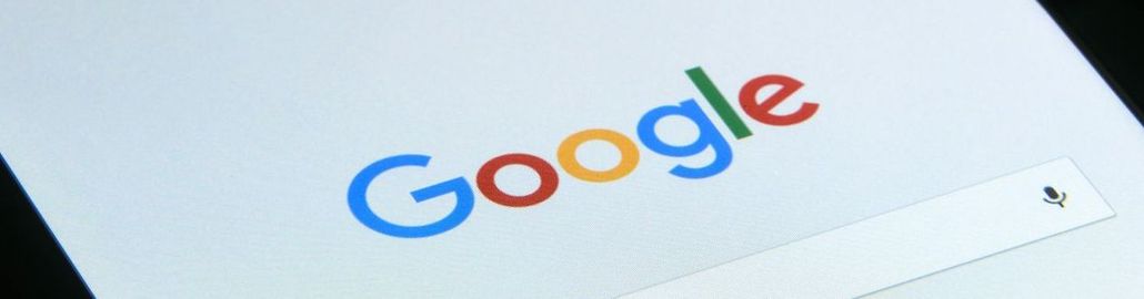 A close-up of a Google search page on a tablet.
