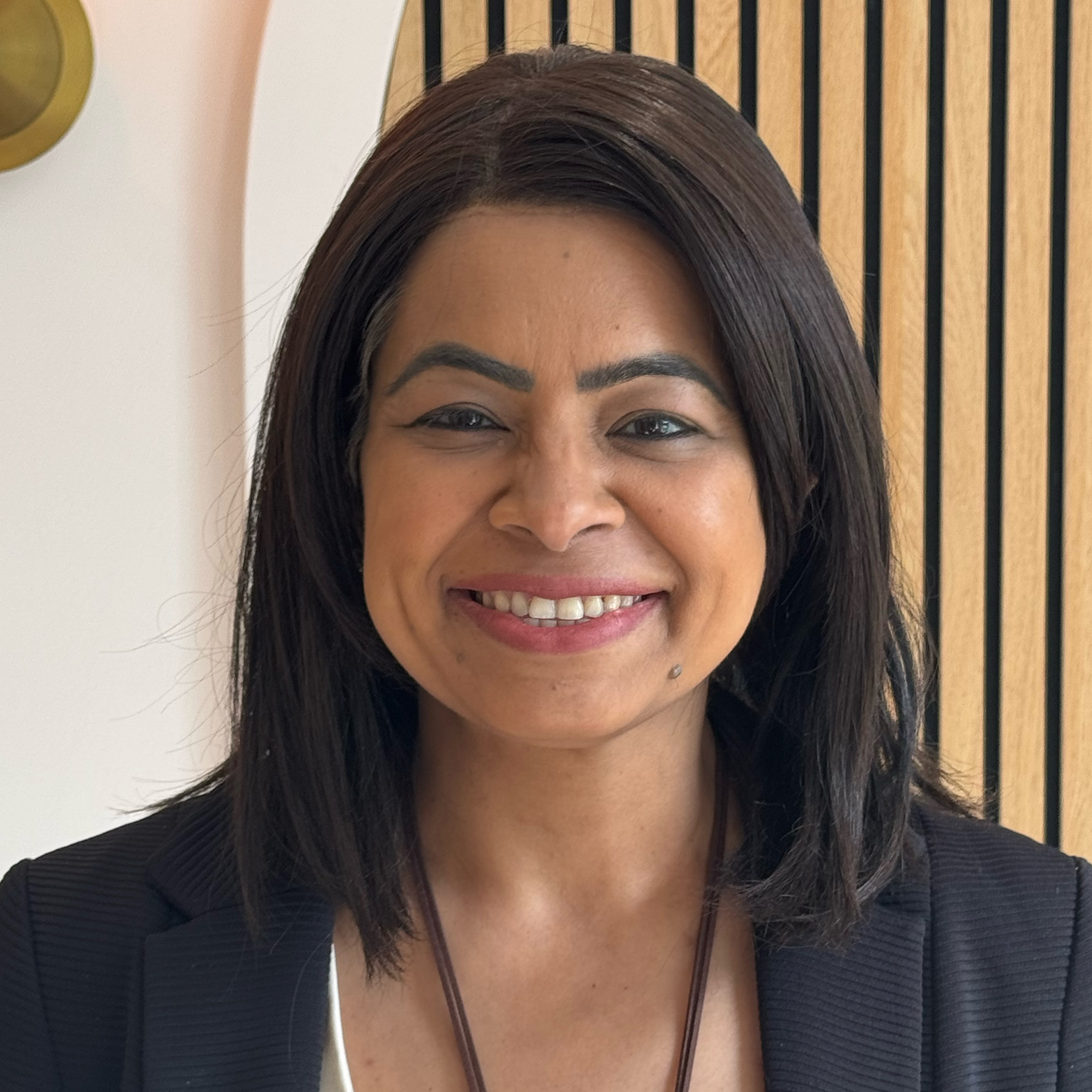 Dr Muninder Walia