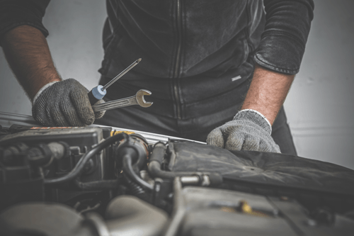 Auto Repair - A man Repairing the Auto in La Porte, IN