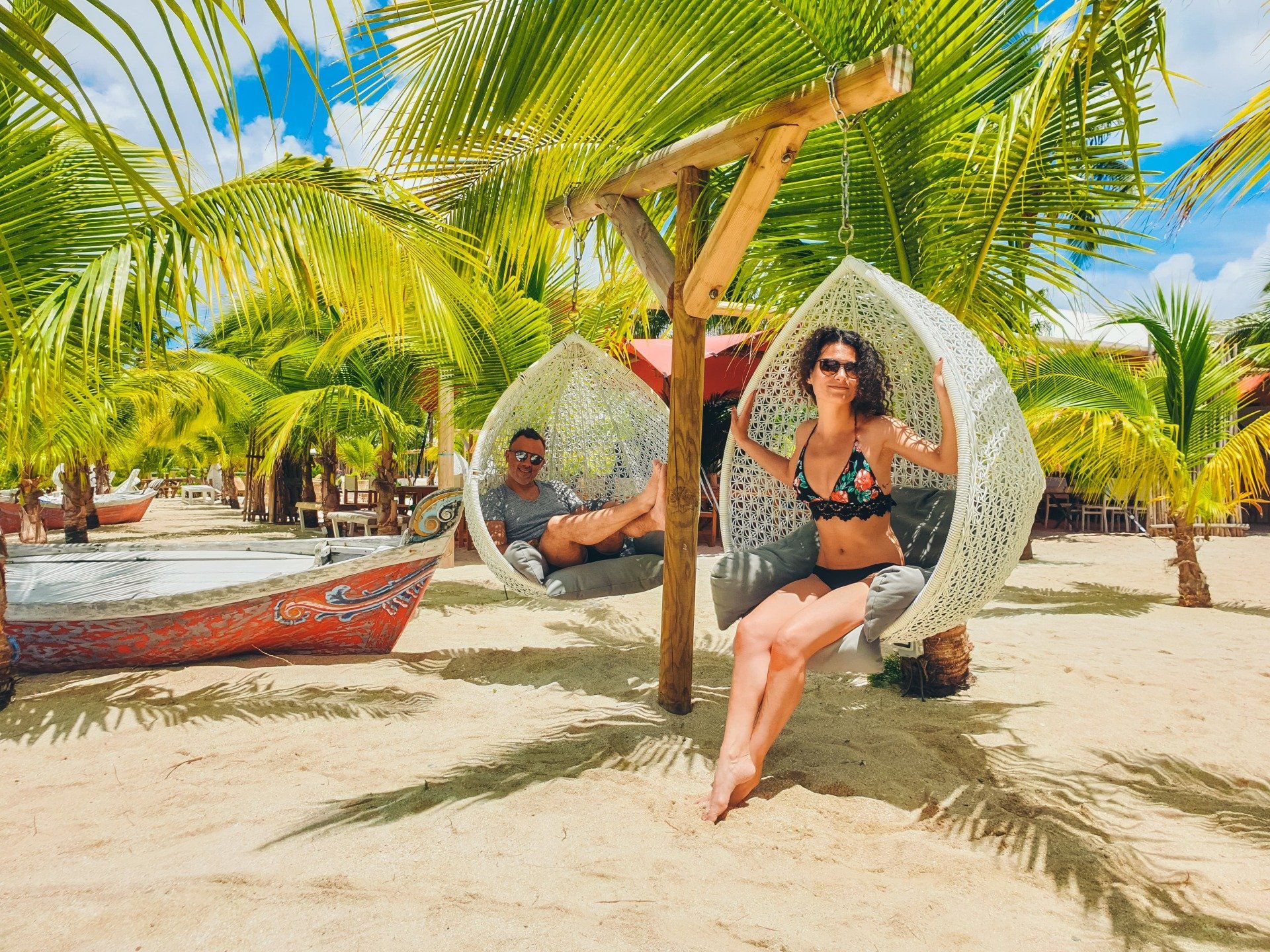 Couple on a beach hanging chair