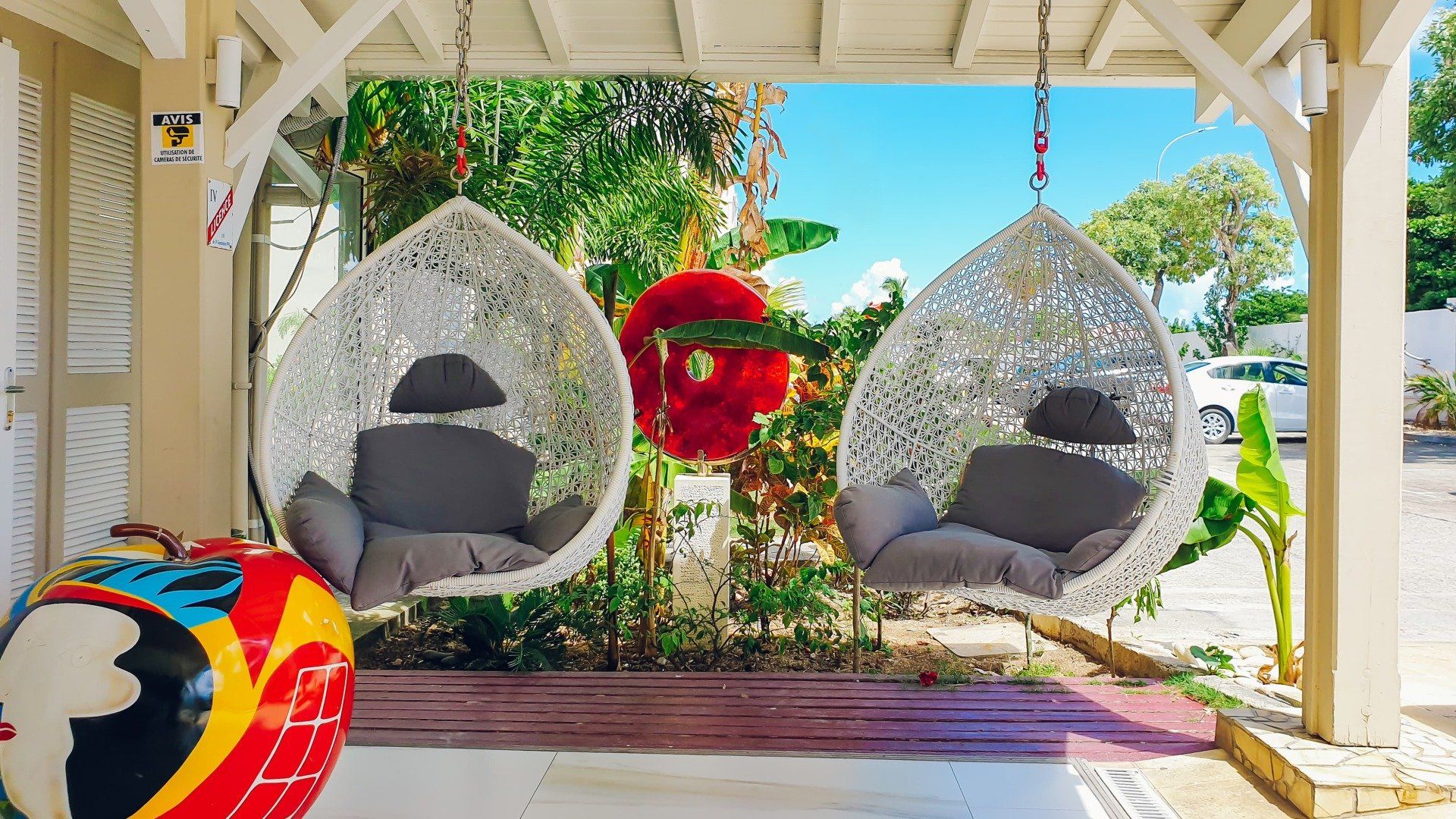 Hanging chairs outside the hotel