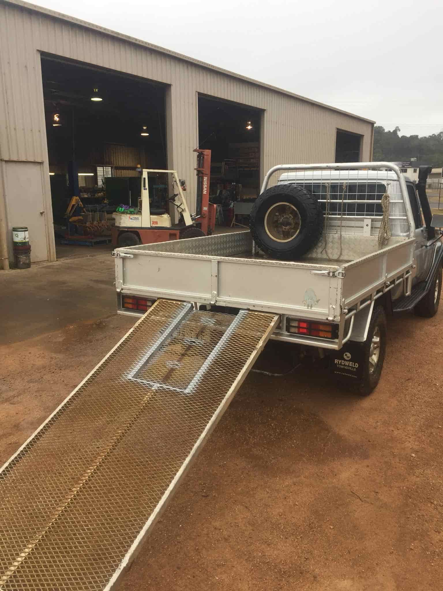A Pickup Truck With Ramps Extended — Boycey's Custom Engineering in Atherton, QLD