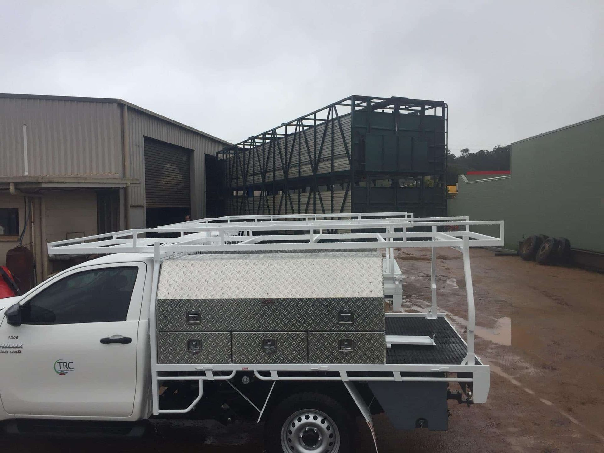 White Work Truck With a Diamond Plate Toolbox — Boycey's Custom Engineering in Atherton, QLD