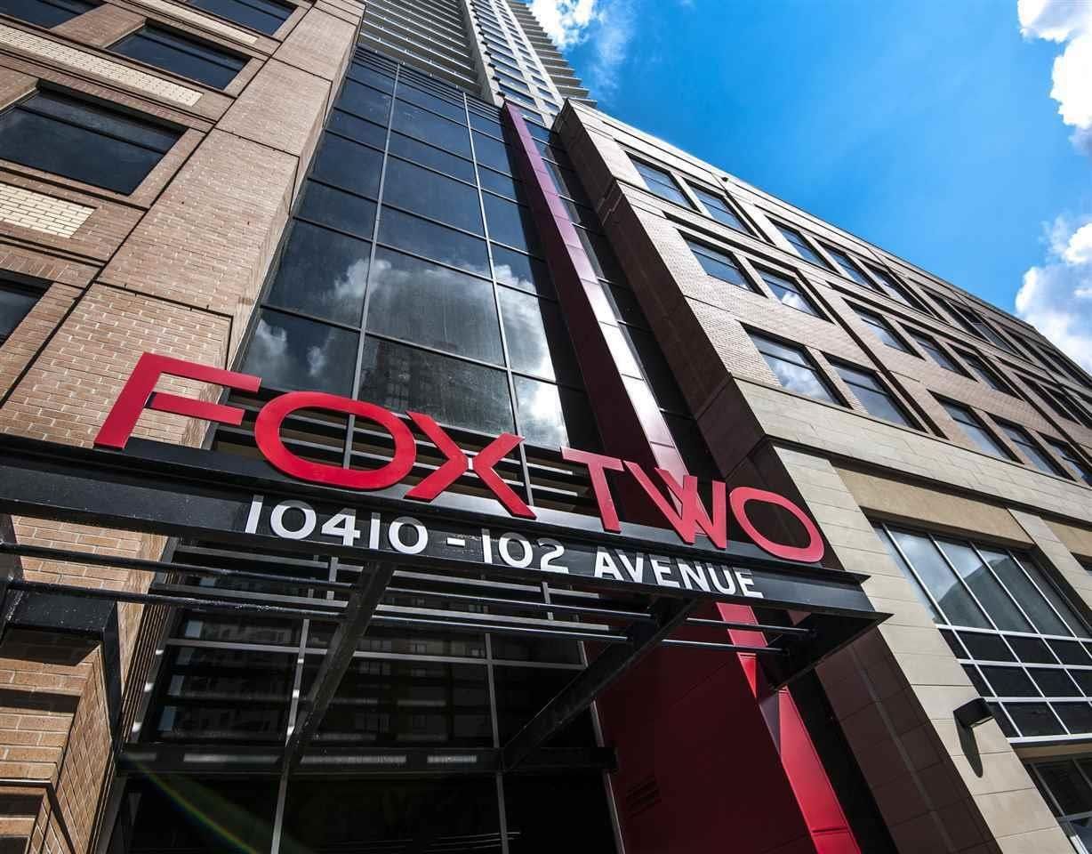 Front Doors of Fox tower 2 in white writing address is written below the  red sing of fox tower 2 Edmonton executive  suites