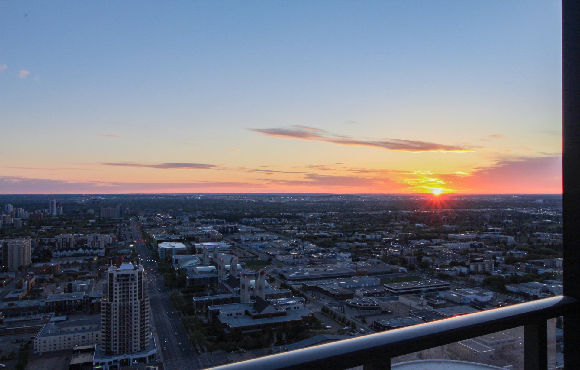 Spectacular r sunset over downtown Edmonton from this 37th floor Edmonton furnished apartment
