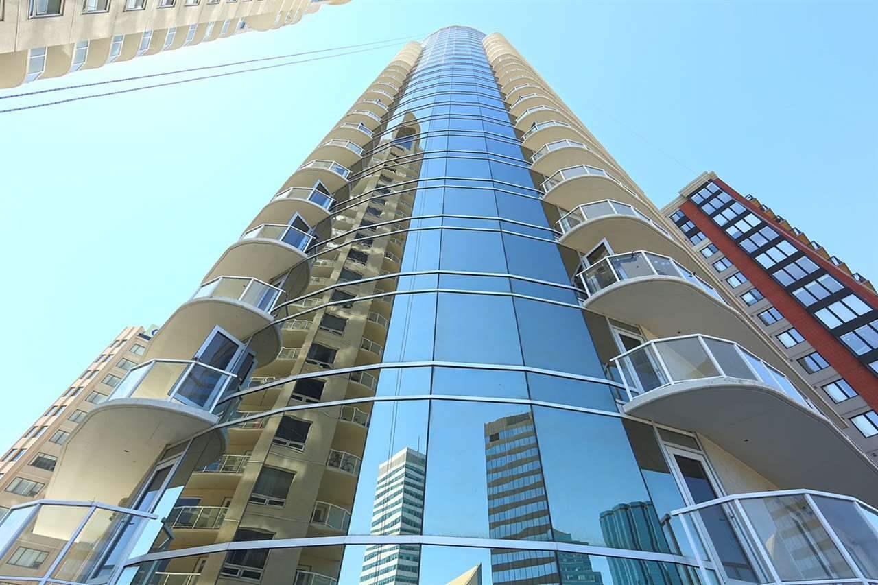 White balconies and large rounded glass windows on Icon tower 1 in edmonton