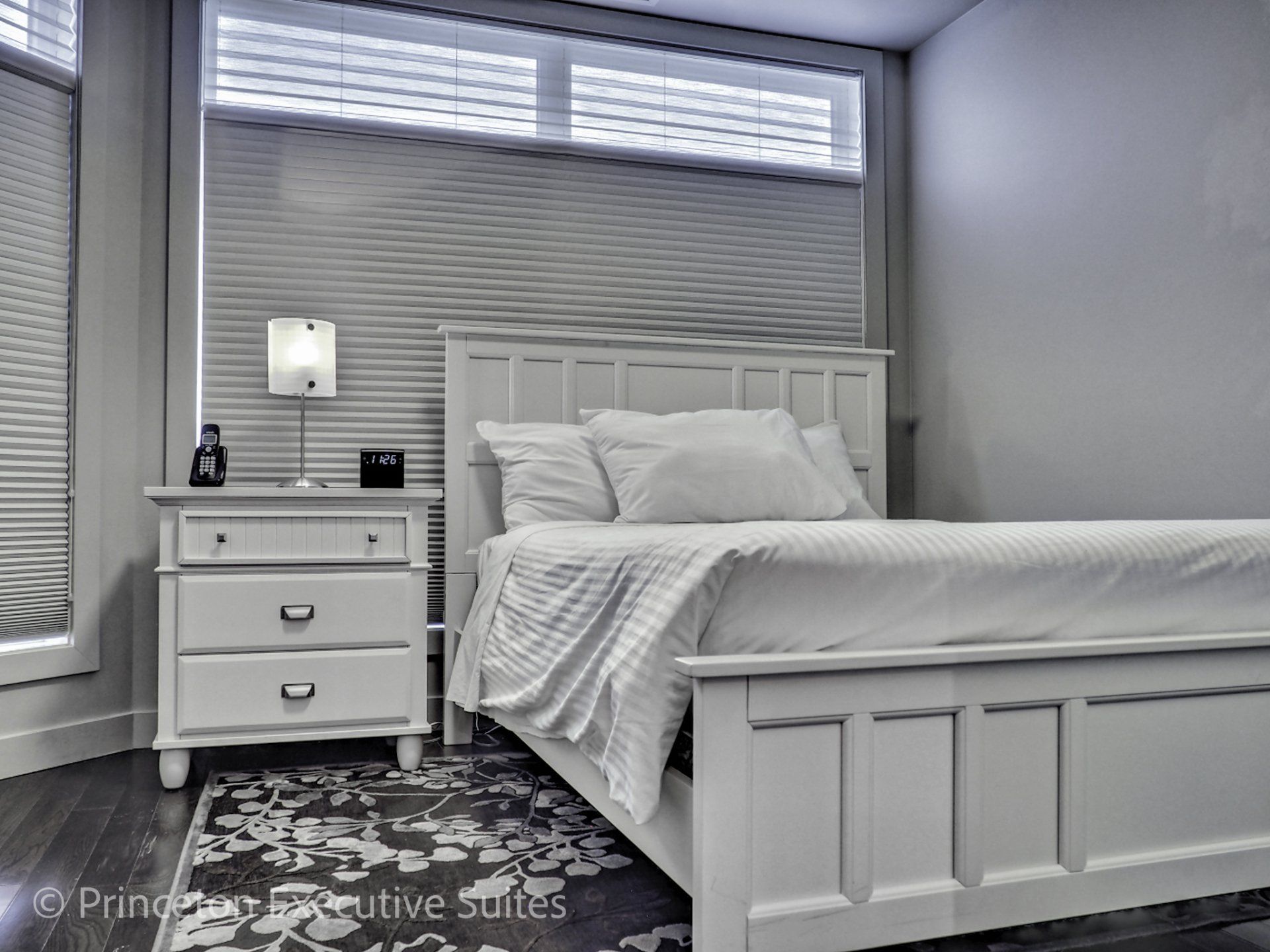 White bedroom suite in Edmonton furnished suite