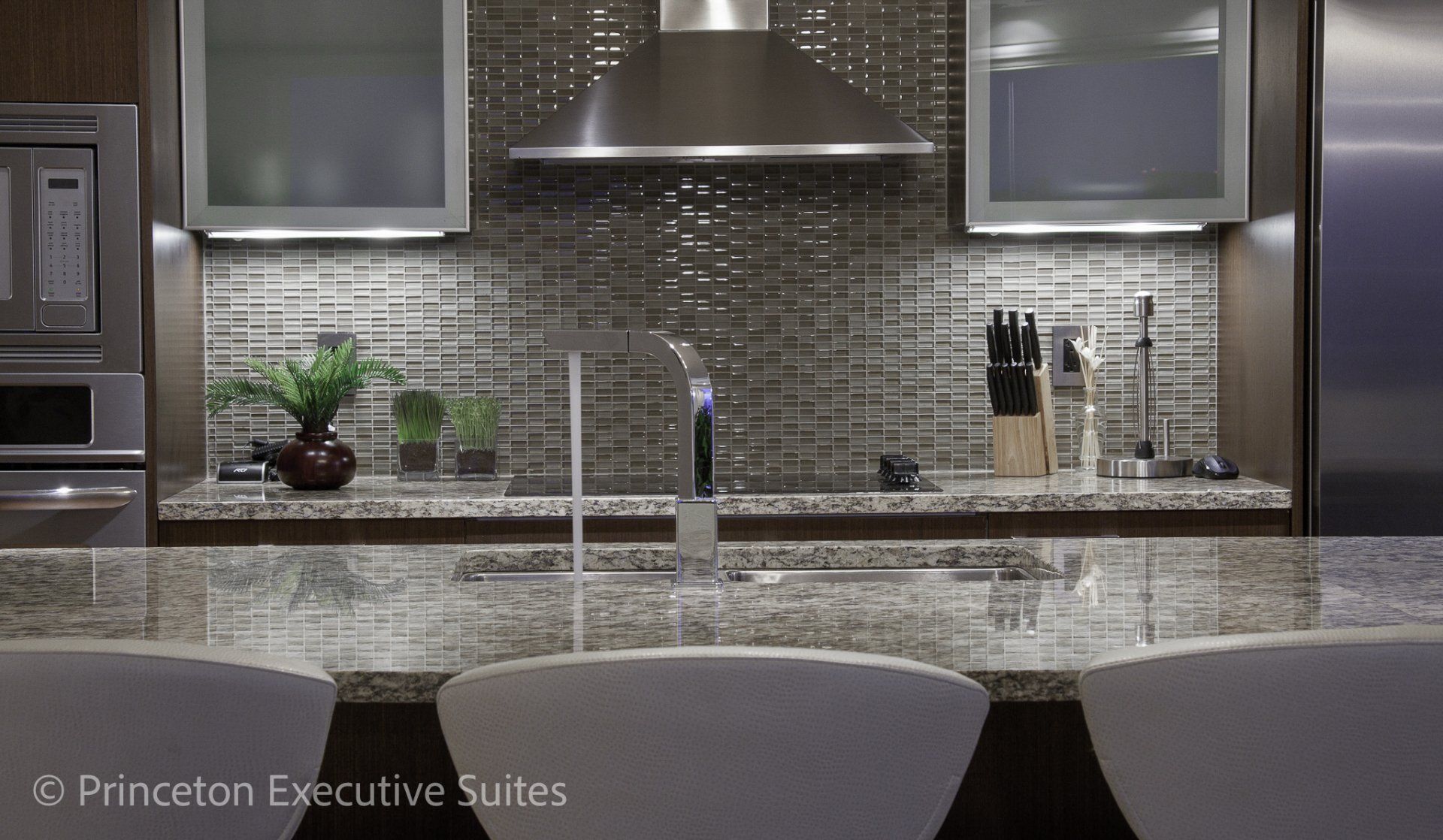 Granite counter top kitchen island in Edmonton luxury furnished suite