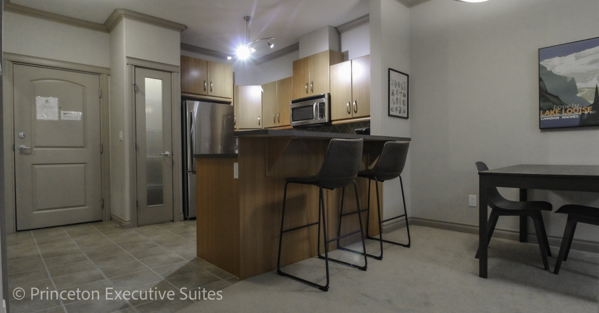 Eating bar and kitchen of Edmonton furnished apartment