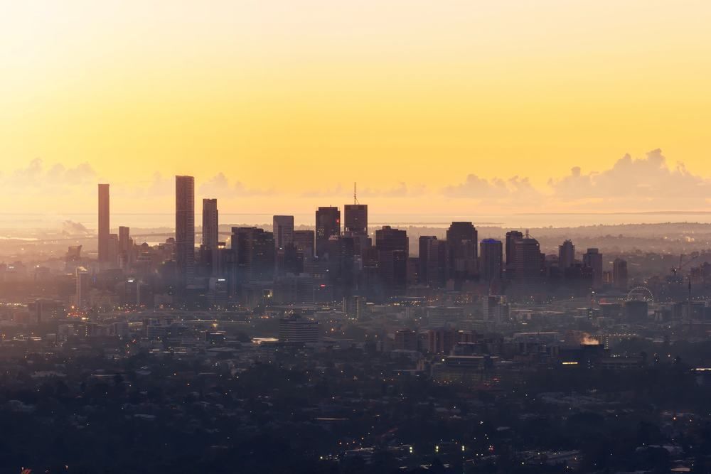 An Aerial View Of A City Skyline At Sunset — Central Coast Flyscreen Service In West Gosford, NSW