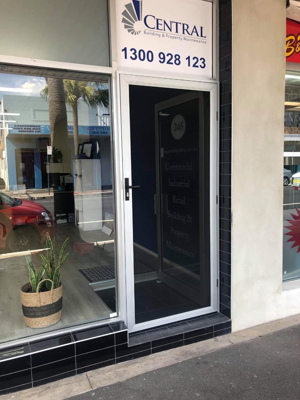A Store Front With A Screen Door — Central Coast Flyscreen Service In Woy Woy, NSW